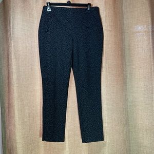Fabulously Slimming by Chico’s Black animal print slacks. Chico’s size 0